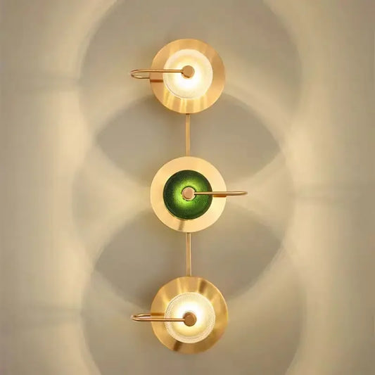 Art deco circle wall light mounted on a luxury living room wall.