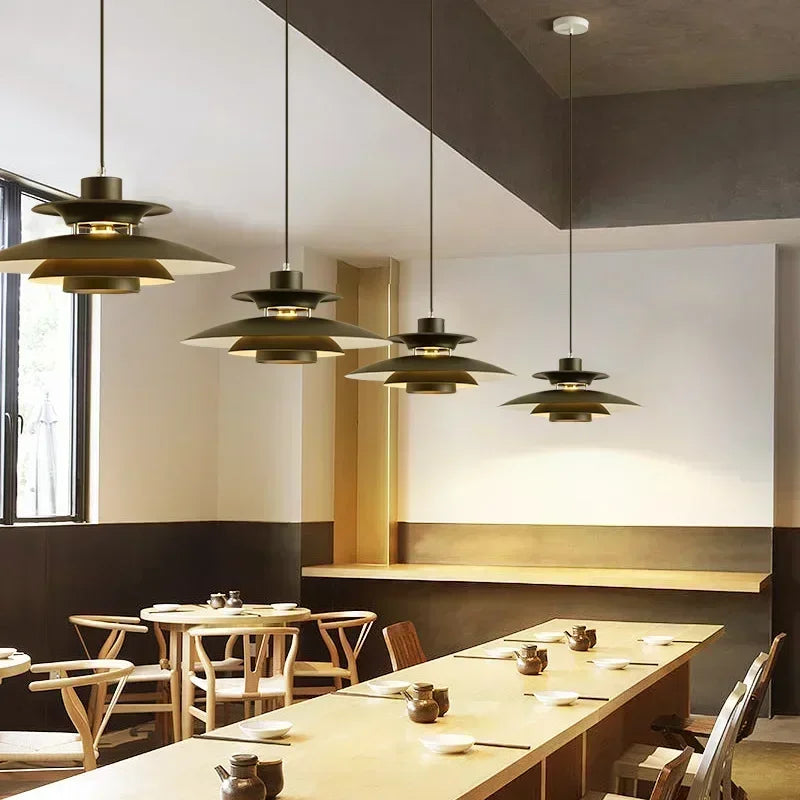 Black pendant light over kitchen island with sleek design