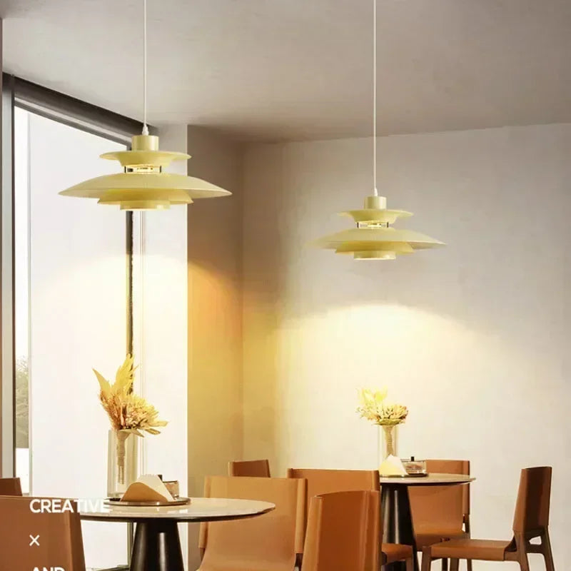 Contemporary glass pendant light fixture with soft glow