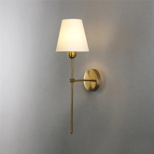 Hardwired wall sconce lights in a minimalist dining room for warm ambient lighting.