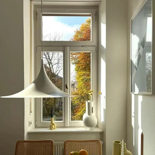 High-quality Danish Lamp with white lampshade in a modern study.