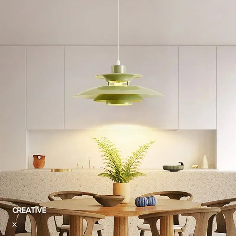 Minimalist LED pendant lighting with plated metal finish