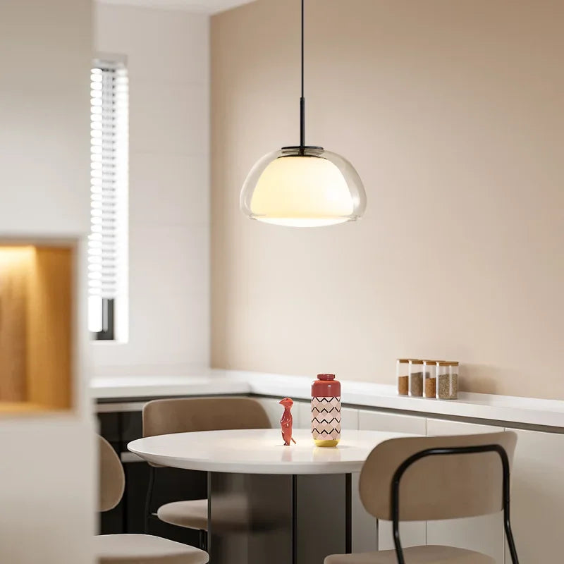 Nordic suspension light hanging over minimalist kitchen island