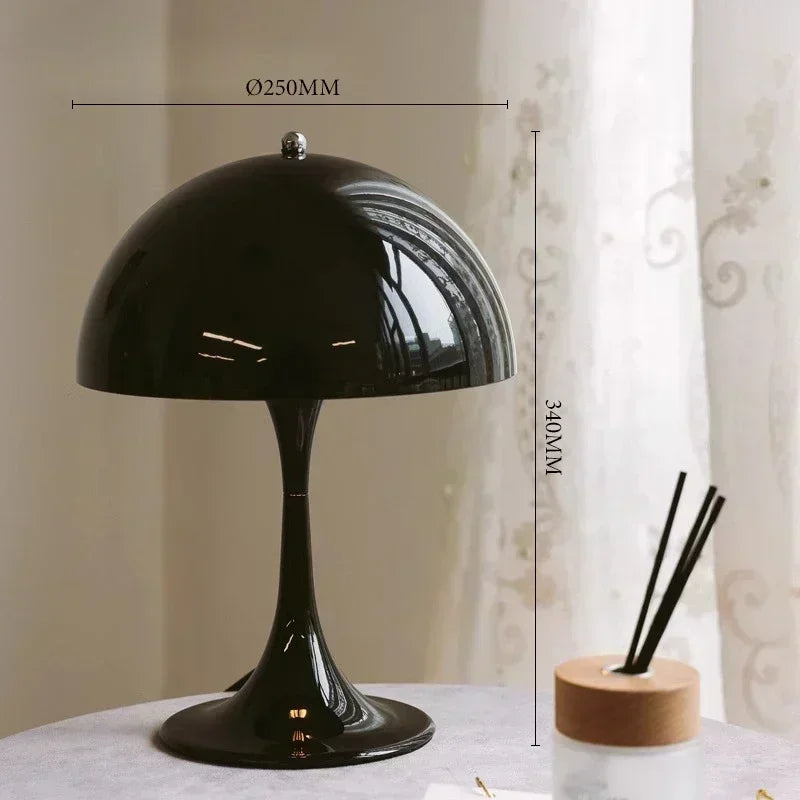 Black table lamp with measurements on a neutral background
