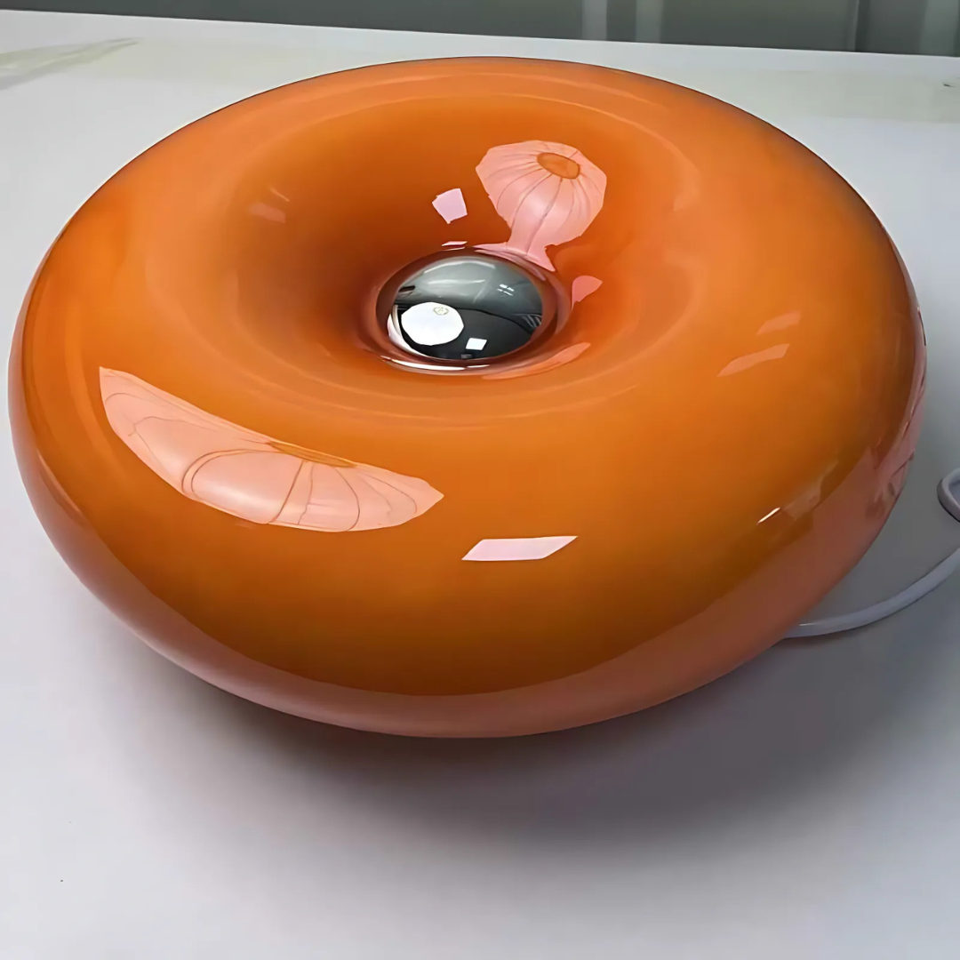 Soft glow Bauhaus table lamp with artistic circular shape and modern aesthetic appeal