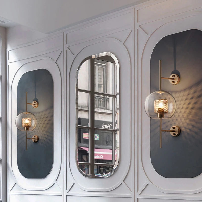 led wall sconce lights with elegant gold finish and clear glass