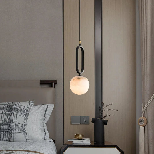 modern luxury pendant light with polished copper and natural marble