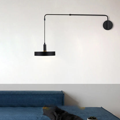 Bedroom wall sconce lights providing focused downward illumination for reading.
