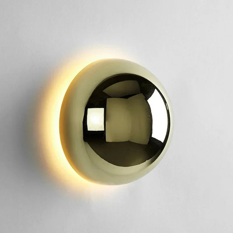 Circular corridor accent lighting featuring an eclipse halo effect and acrylic diffuser.
