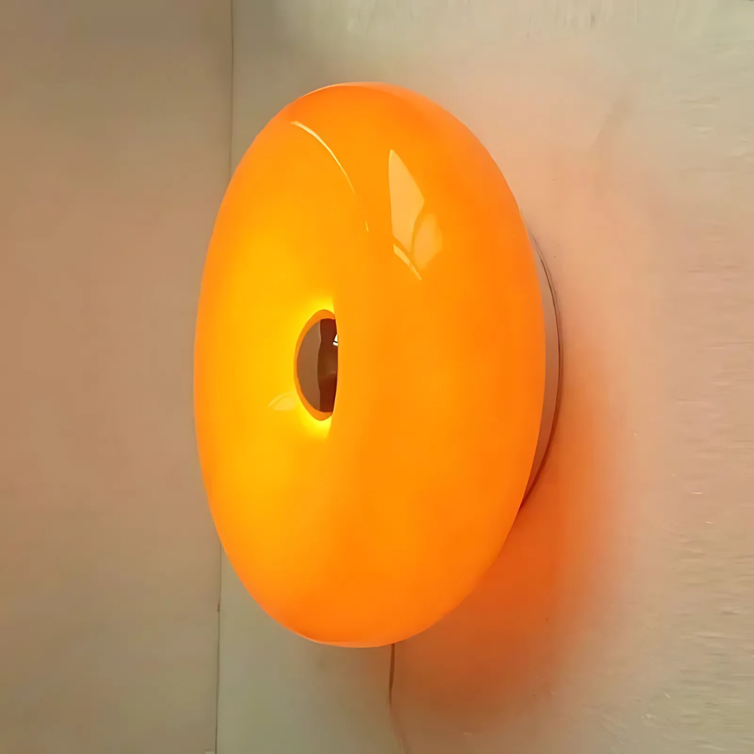 Contemporary desk lamp inspired by IKEA donut design with USB and AC power options