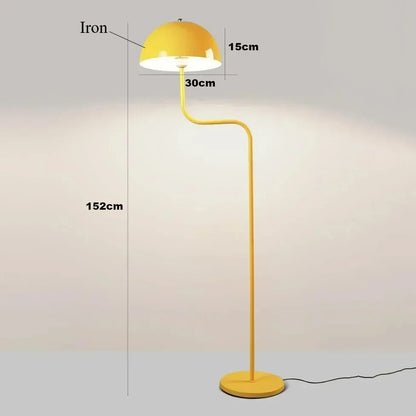Dimmable LED floor lamp creating warm atmosphere in a luxury bedroom.