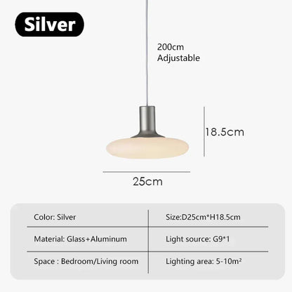 Dining room pendant lights providing energy-efficient warmth over a modern table.