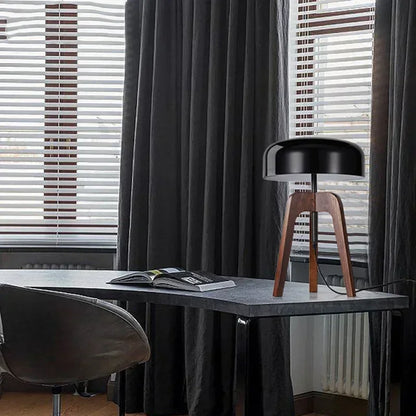 E27 bulb table lamp with polished chrome finish and natural wood tripod legs.