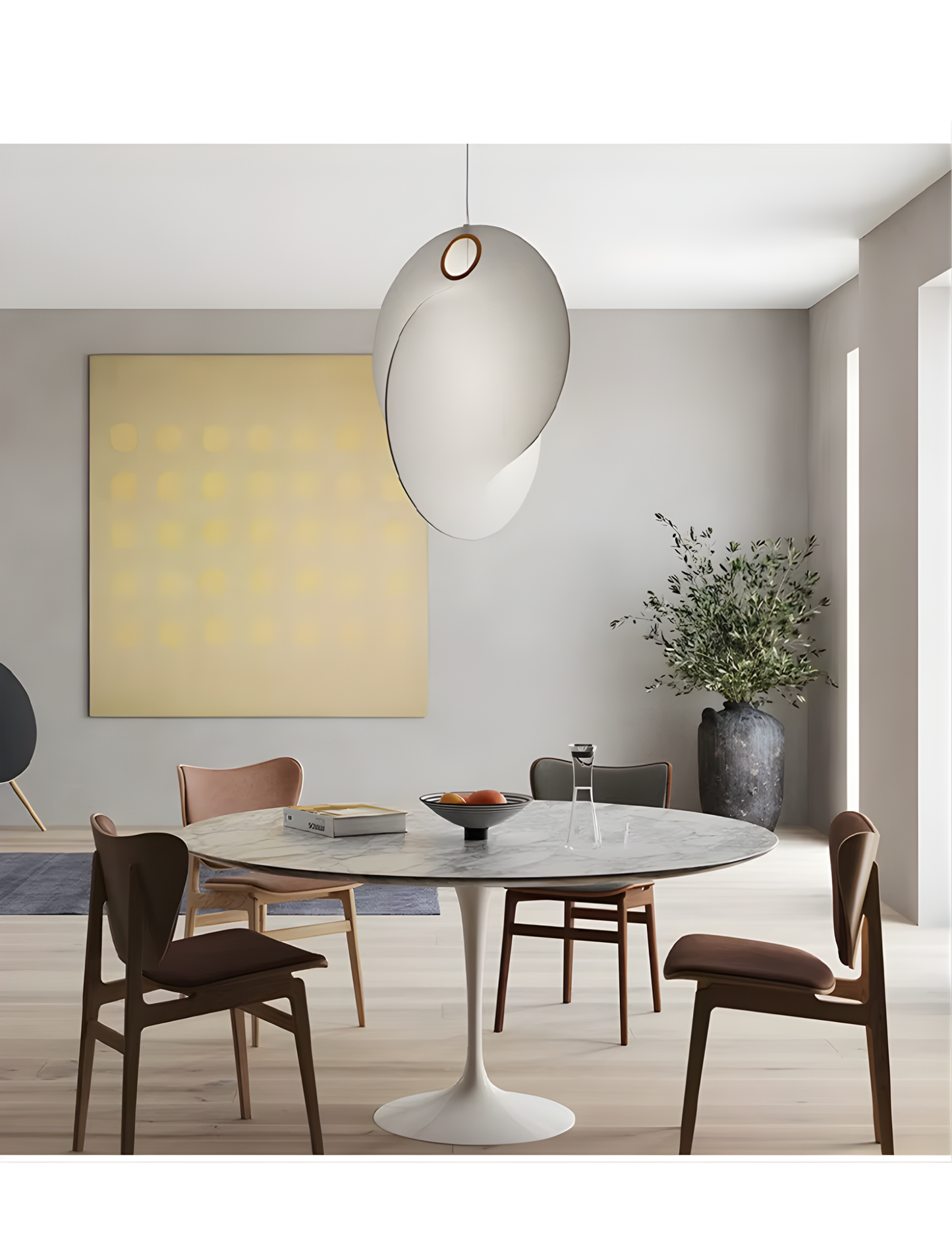 LED pendant lighting in a large living room featuring organic silk textures.