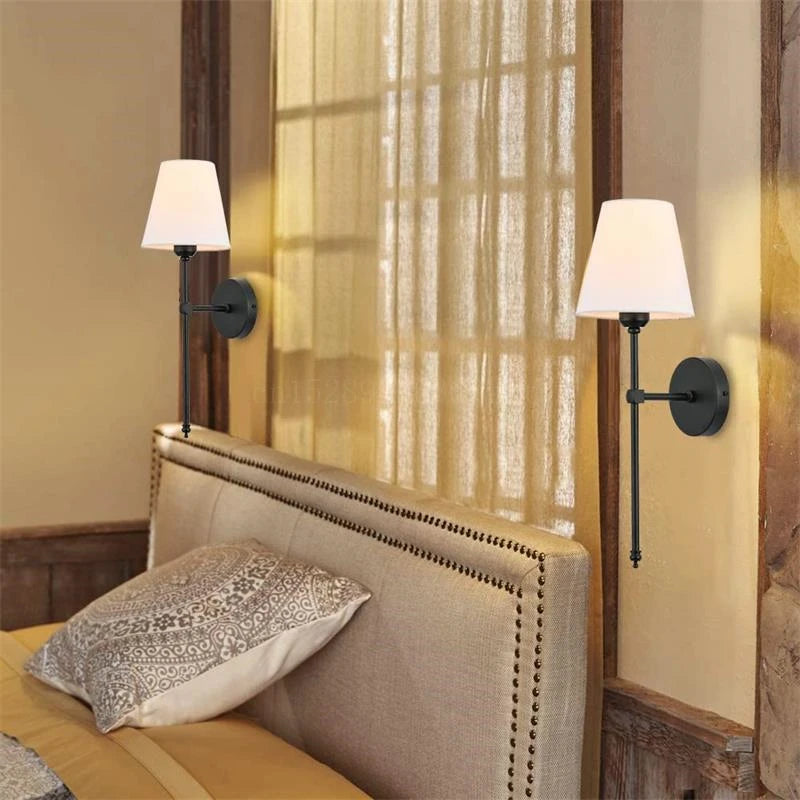 Indoor wall lamp with E27 base and plated finish for professional home lighting.