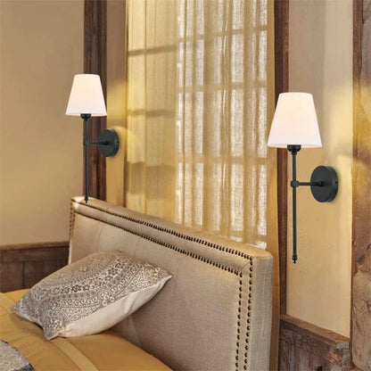 Indoor wall lamp with E27 base and plated finish for professional home lighting.
