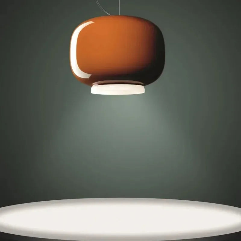 Industrial pendant lights featuring hot-bent Italian glass stone materials.