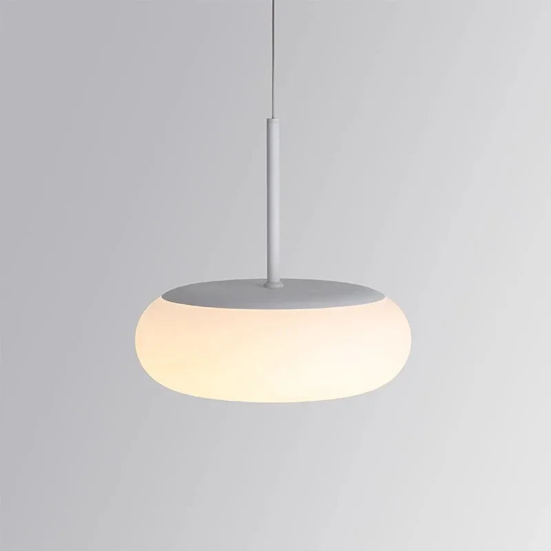 Kitchen Island Pendant Lights large white sphere hanging in a modern kitchen.