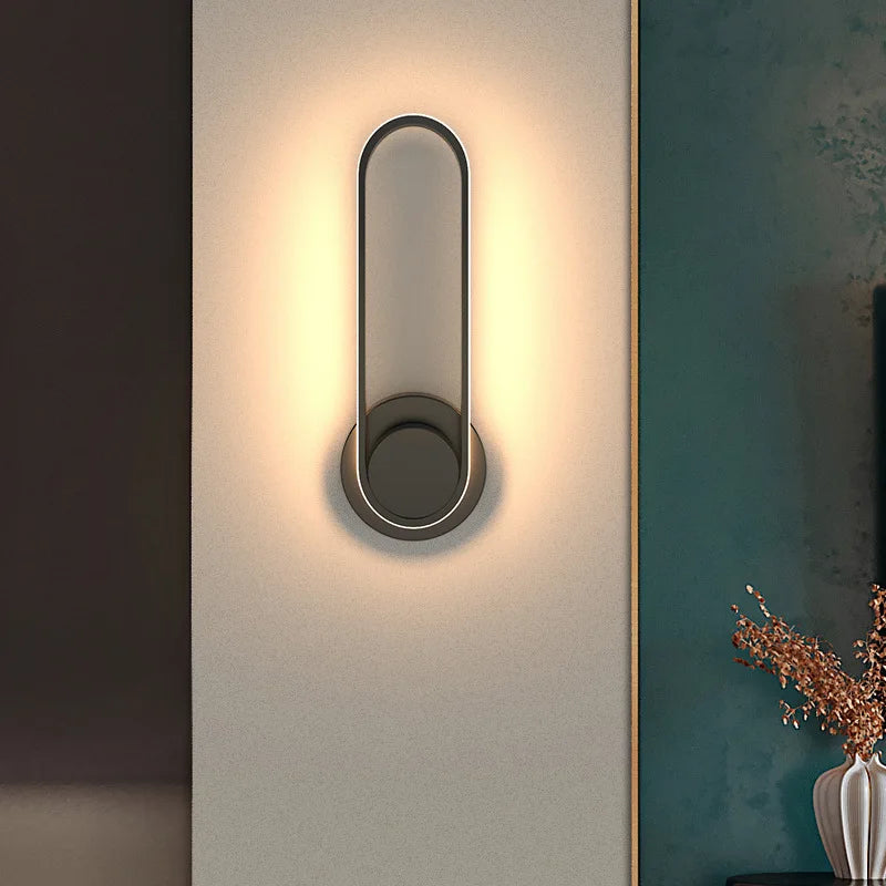Light luxury bedroom bedside wall lamp with adjustable LED beam.