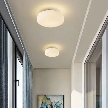 Luxury Pendant Lighting brushed nickel hardware with a matte white acrylic shade.