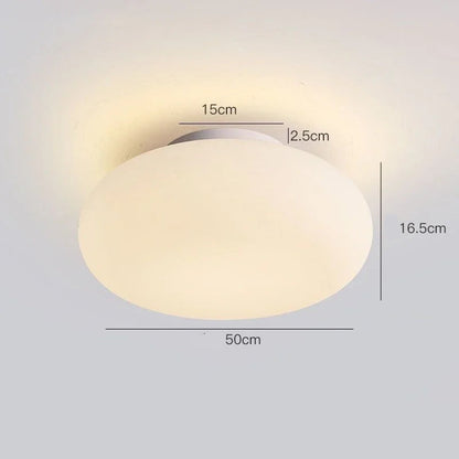 Minimalist Pendant Lighting white ball ceiling lamp for a master bedroom.