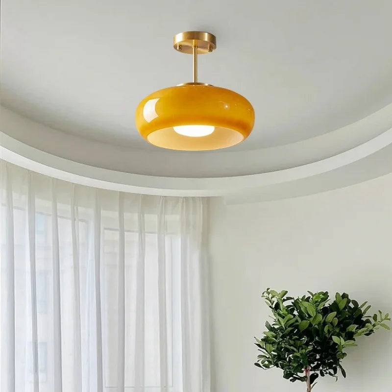 Minimalist retro light fixture above kitchen island