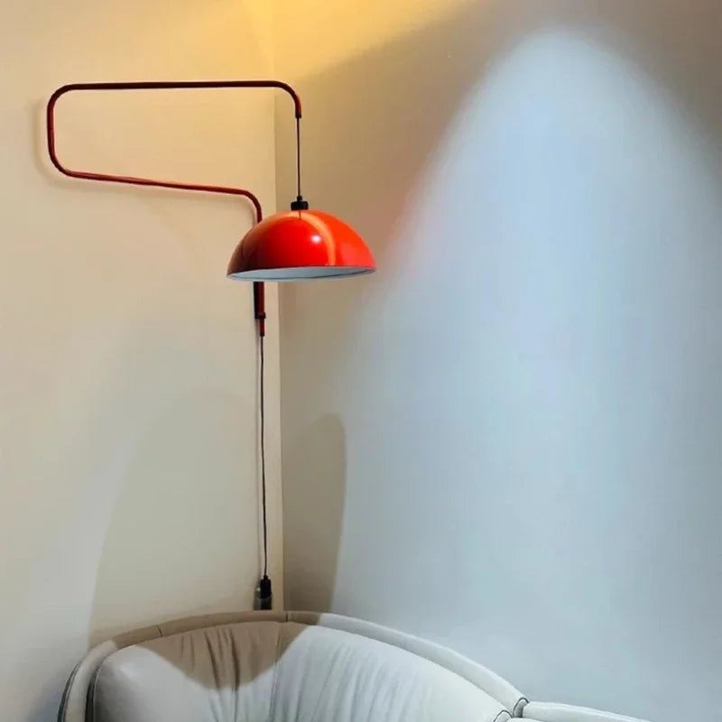 Minimalist wall sconces with white plated finish and adjustable metal arm.