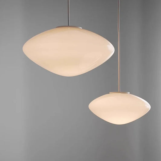Modern Pendant Lights in white glass for a minimalist Nordic kitchen.