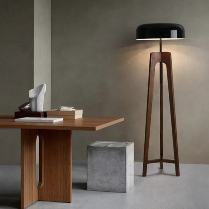 Modern floor lamps with wooden tripod base and mushroom iron shade for foyers.
