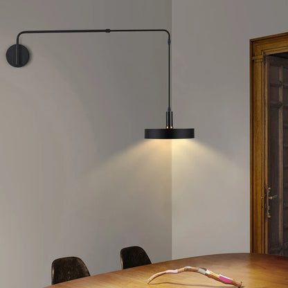 Modern wall sconces with long black adjustable arm for bedroom bedside reading.