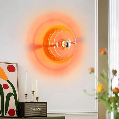 Nordic Bauhaus wall lamps in vibrant orange for a modern living room.