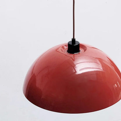 Nordic LED wall lamp with retractable arm standing out against a white wall.
