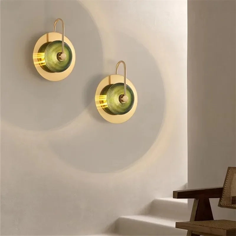 Nordic minimalist crystal sconce featuring a stained glass shade.