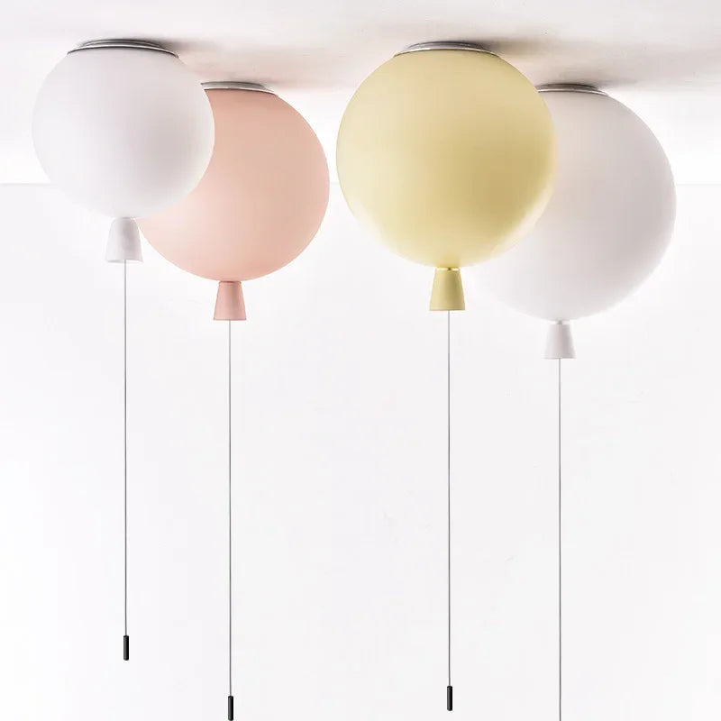 Nordic pendant lights in a colorful balloon shape for a modern children's bedroom.