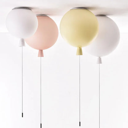 Nordic pendant lights in a colorful balloon shape for a modern children's bedroom.