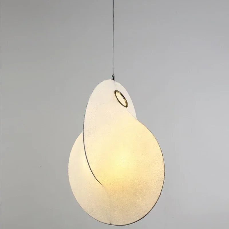 Nordic pendant lights styled in a hotel hall for soft, diffused ambient light.