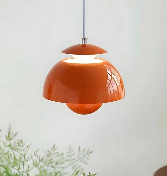LED ceiling pendant shaped like a lotus flower with a soft glow in a minimalist study room.