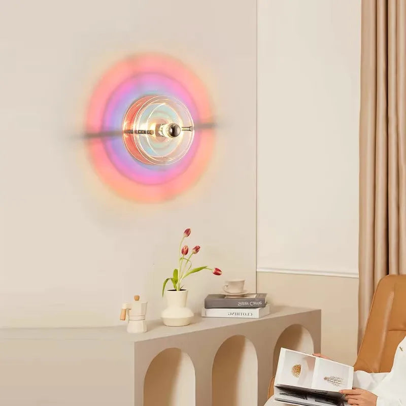 Retro acrylic wall lamp featuring the halo effect on a white wall.