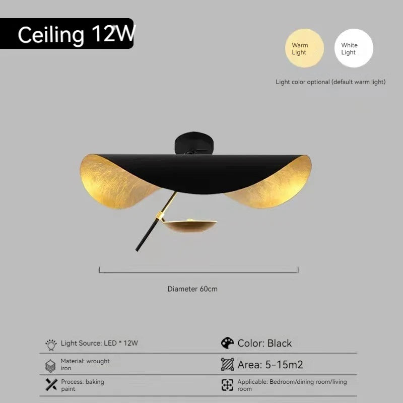 Ceiling light fixture with black and gold design on a gray background