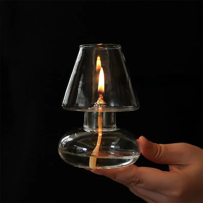 Glass oil lamp styled as wedding table centerpiece