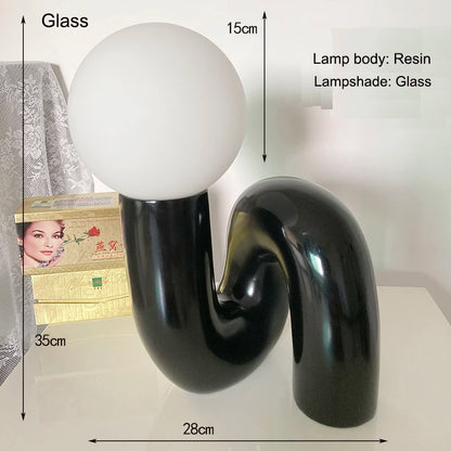 Modern black and white lamp with dimensions labeled