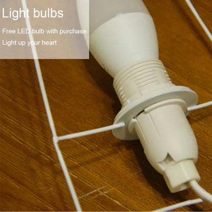 Homestay art lamp with white washi paper shade and energy-efficient LED bulb.