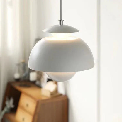 Gray pendant light fixture in a room with blurred background