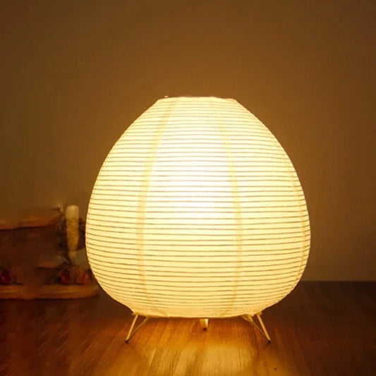 Washi rice paper LED table lamp with authentic Japanese lantern design for zen living rooms.