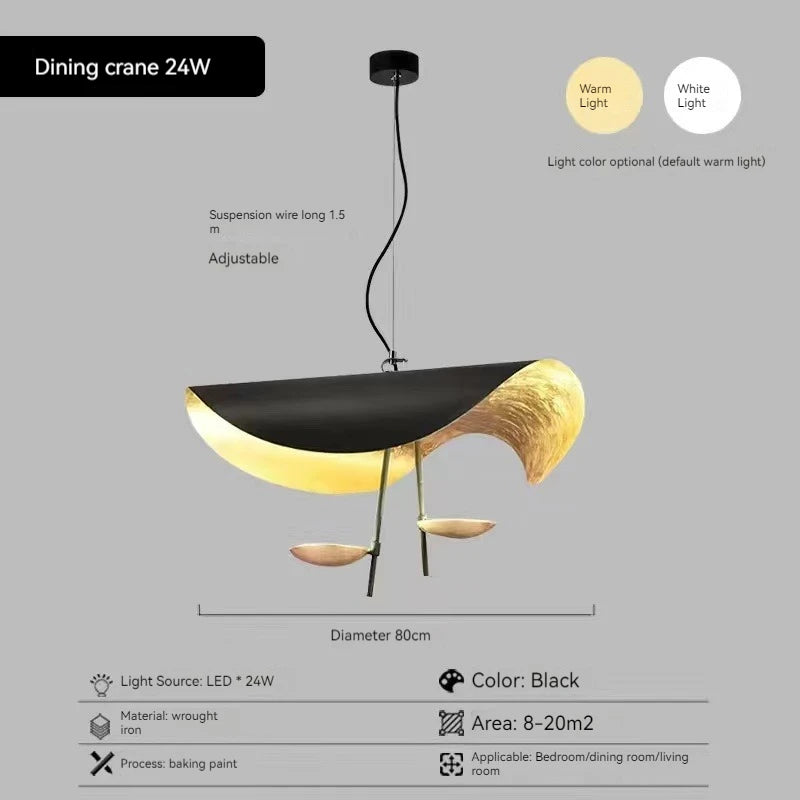 Dining crane light fixture with black and gold design on a gray background