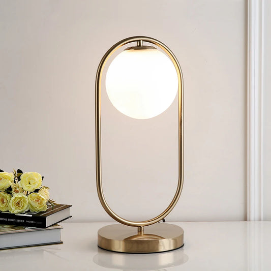 chaitra frosted glass table lamp with gold accents
